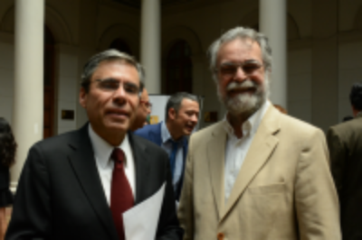 Los académicos Carlos Conca y Fernando Lund. 