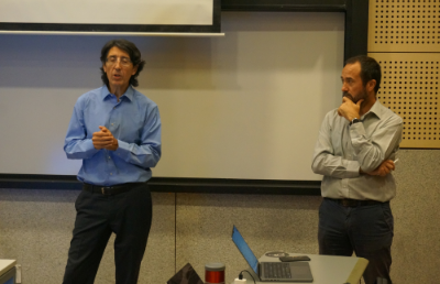 El Director de Investigación de la Universidad de Chile, Rodrigo Fuster, y el prof. Javier Ruiz del Solar, director ejecutivo del AMTC.