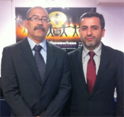 Egbert Sánchez, académico coordinador del simposio, y Jorge Pérez, encargado de transparencia activa de la U. de Chile.